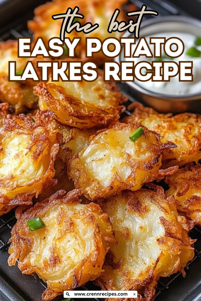 Stack of golden potato latkes with sour cream and green garnish, labeled “The Best Easy Potato Latkes Recipe”