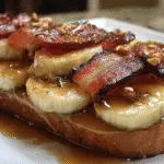 Bacon Banana Bomber sandwich with crispy applewood-smoked bacon and caramelized bananas on artisan bread