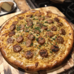 Oktoberfest Sausage Sauerkraut Pizza — restaurant-quality recipe photo