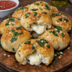 How to make Giant Mozzarella Stuffed Garlic Knot Pizza Bites — key cooking step