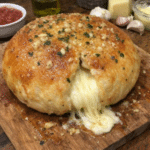 How to make Giant Cheese-Stuffed Garlic Butter Pizza Dough Bomb — key cooking step